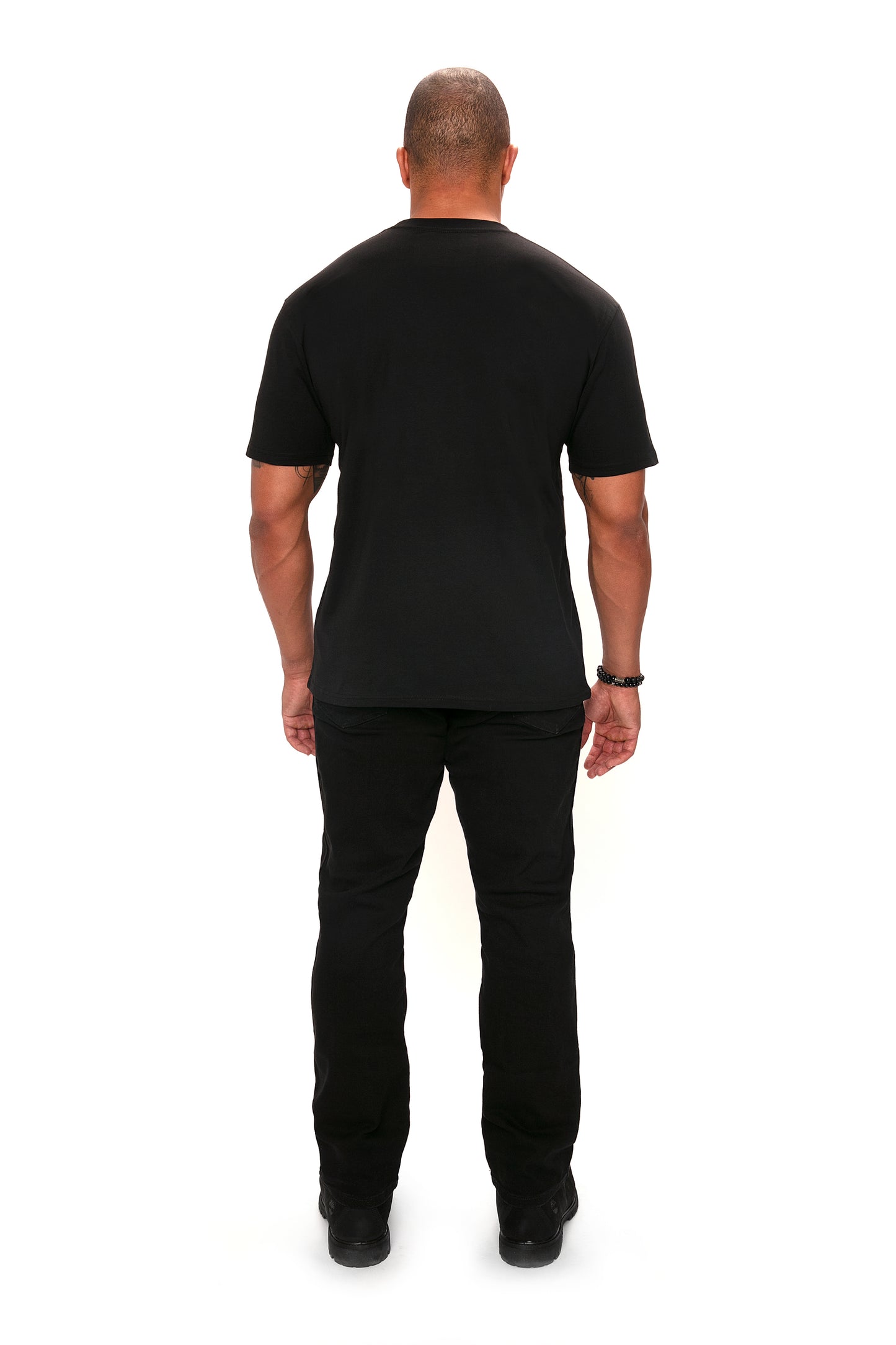 Model wearing the Forty Five Supply Signature Tee in Black in size XL, back view